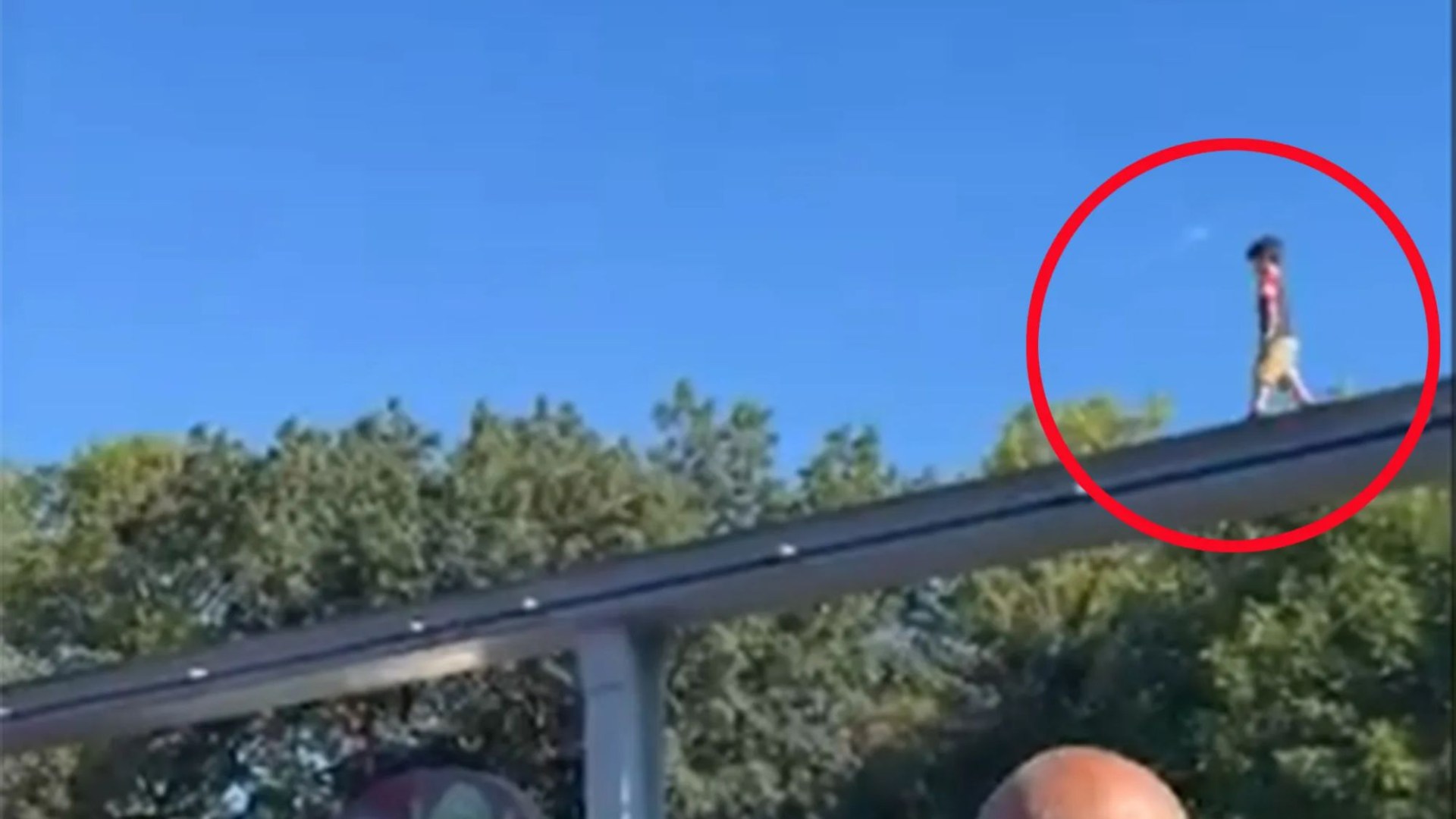 Heart-stopping video shows missing child found walking alone on top of 100ft monorail track at popular park