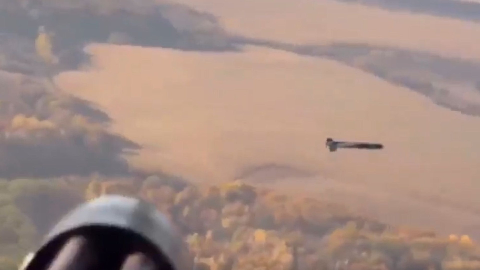 Stunning moment Ukrainian helicopter shoots down Russian drone mid-air with fast-firing minigun blitz