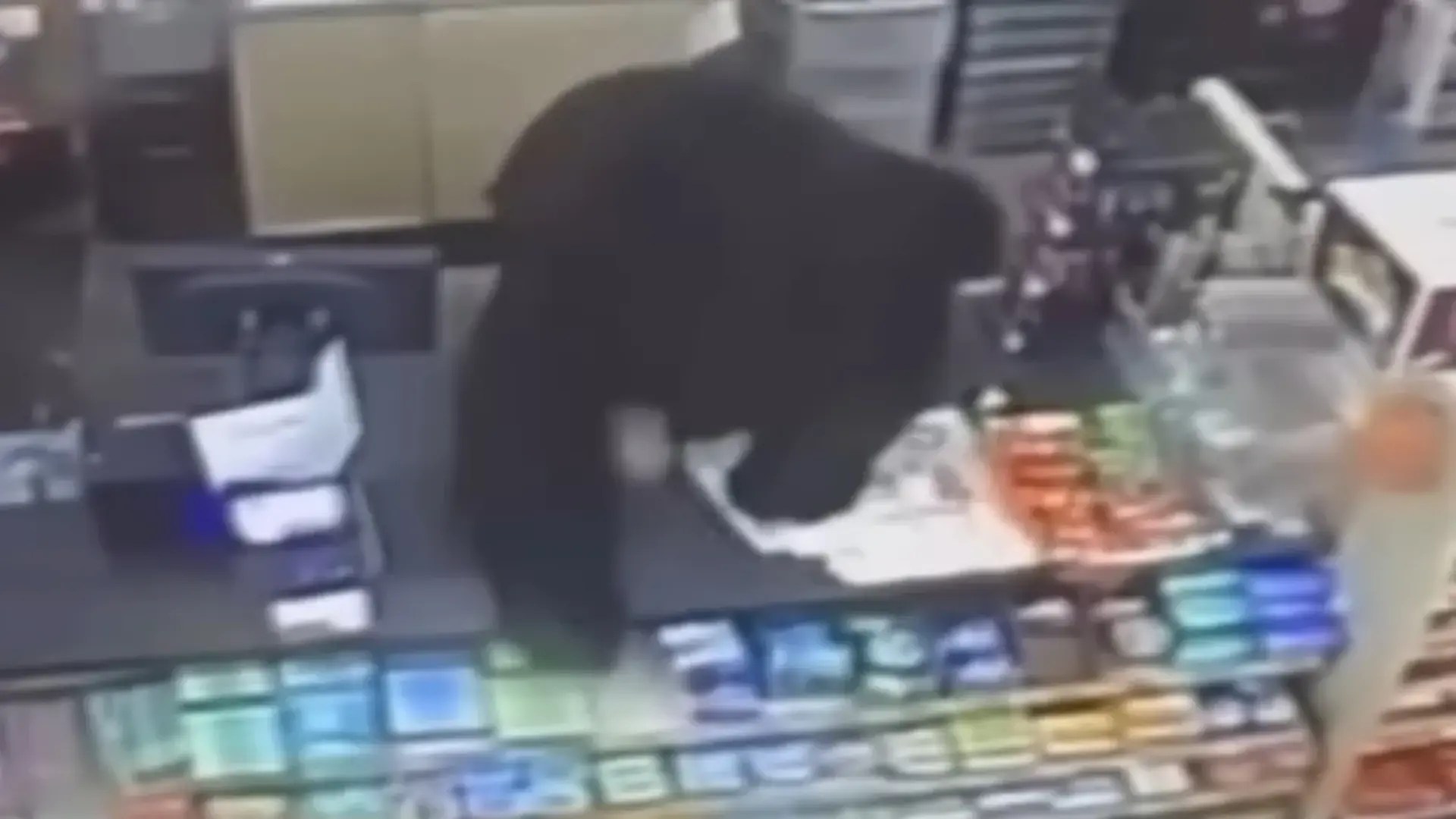 Horror moment ferocious black bear chases screaming boy, 11, into store before leaping over counter to get at him
